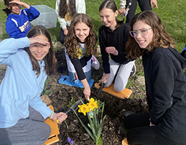  West Patent student celebrate Earth Day in the garden